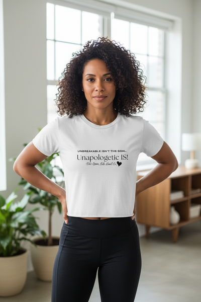 Women’s Flowy Cropped Graphic Tee – Unbreakable Isn’t the Goal, Unapologetic Is