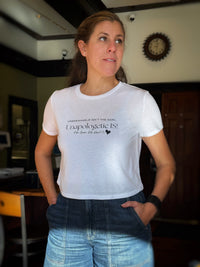 Women’s Flowy Cropped Graphic Tee – Unbreakable Isn’t the Goal, Unapologetic Is